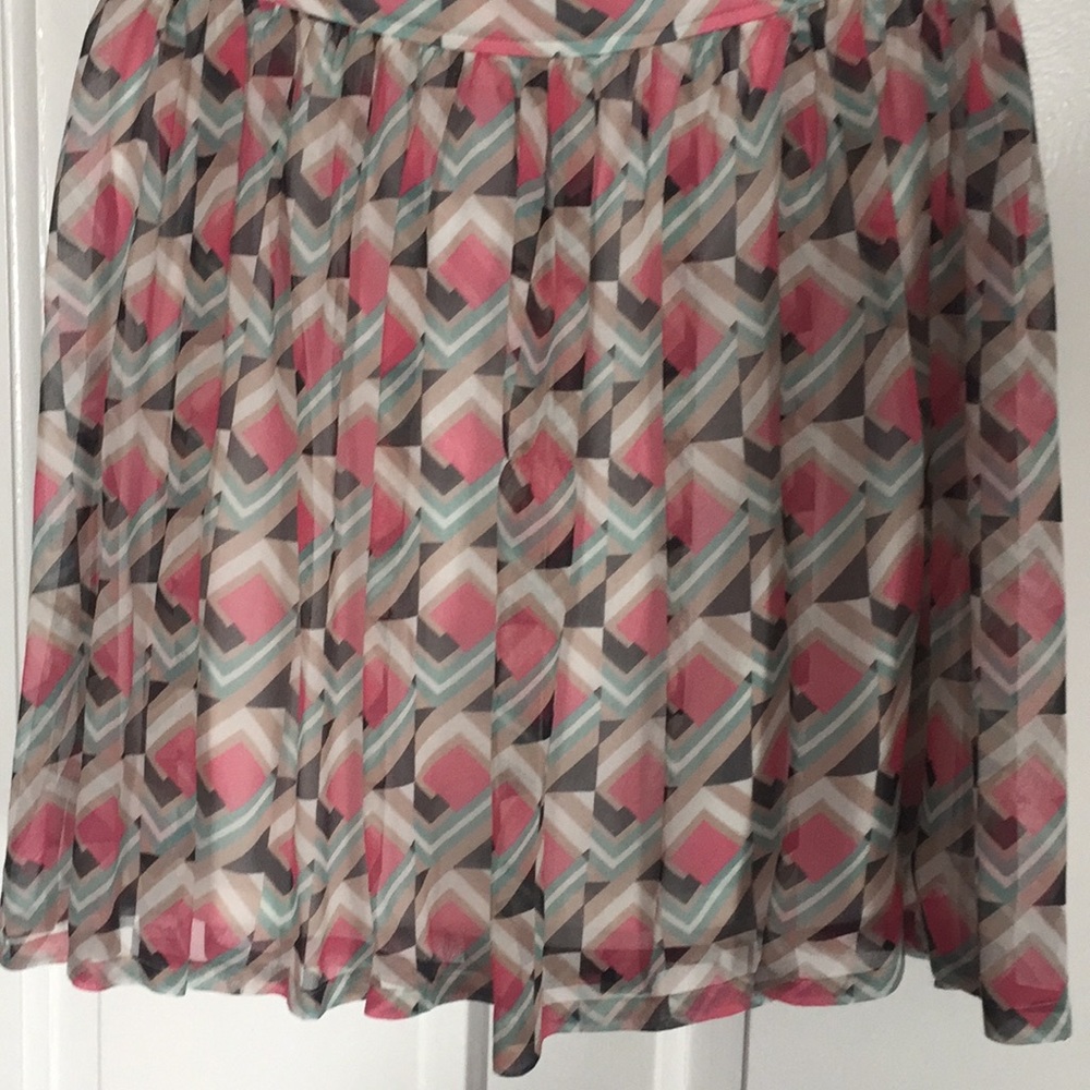 Pattered pleated mini skirt